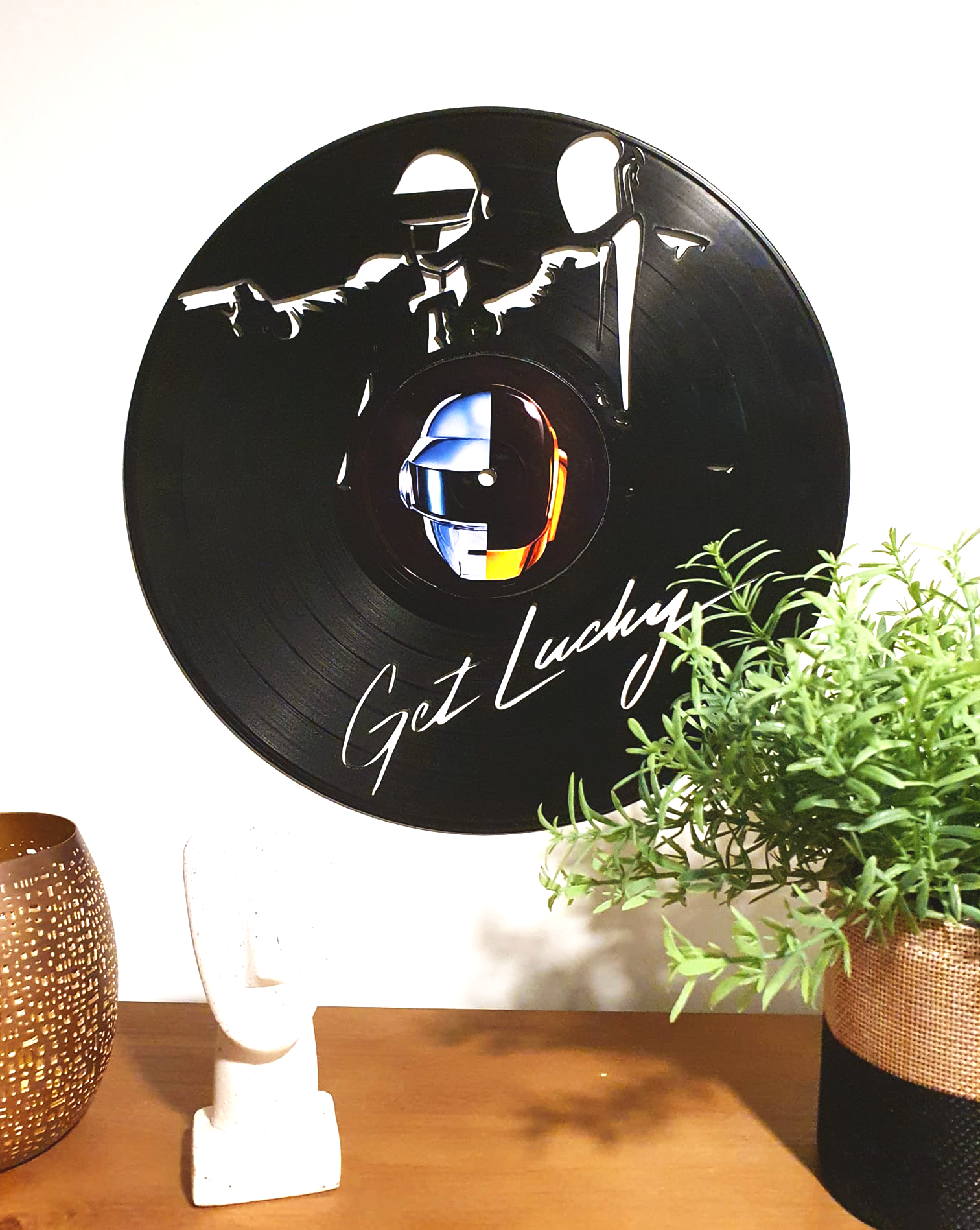 Daft Punk Looking for a special gift? Our Daft Punk featured LP is perfect  for you! Carved with love this decorative Vinyl will stand out in your room  with its unique design